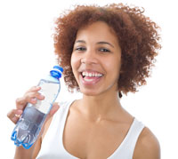 Photo of woman drinking water.
