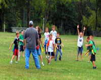 Photo of homeschoolers enjoy a game of flag football.