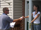 Buncombe County staff person greets citizen