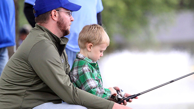 Father and son fishing at Owen Park.