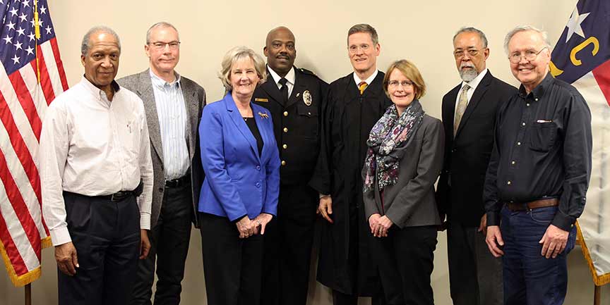 Group photo of the Personnel Advisory Board; left to right: Bill Mance, Larry Dodson, Joan Creasman, Sheriff Quentin Miller, Judge Alan Thornburg, Board Attorney Joy McIver, Dr. Gene Bell, Tom Sobol.