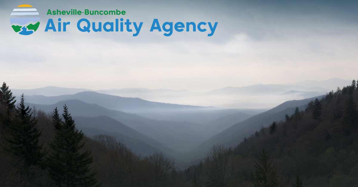 smoke or fog floats over the mountains