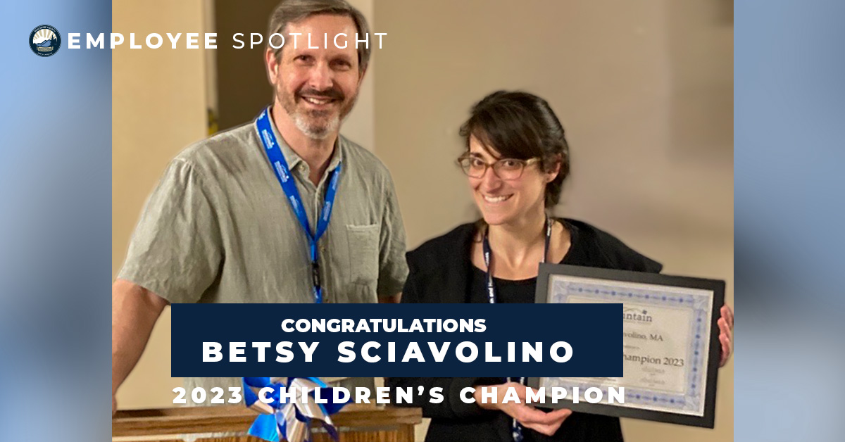 Geoff Sidoli, MCAC Director, presents the Children’s Champion Award to Betsy Sciavolino  