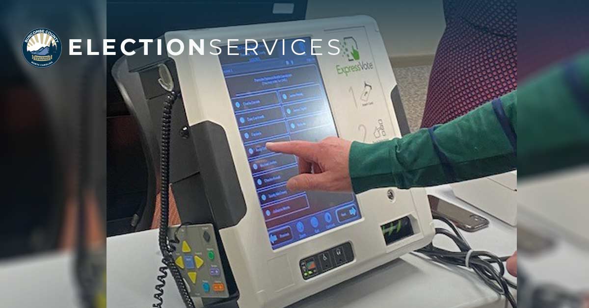 a person marks a ballot on an ExpressVote machine