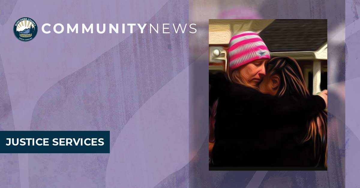 a purple background with an image of women hugging