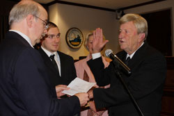 Photo of Mike Fryar being sworn in as a Buncombe County Commissioner.