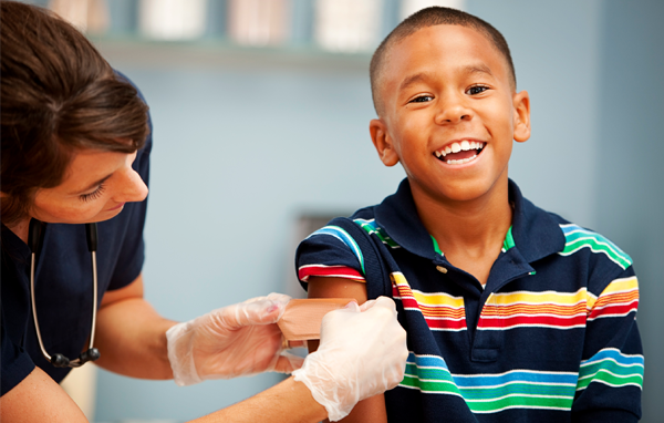 Child getting flu shot.