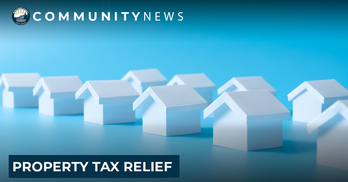 small houses on a blue background with text: Property tax relief