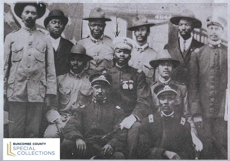 An historic photo of a group of Black men in various uniforms.