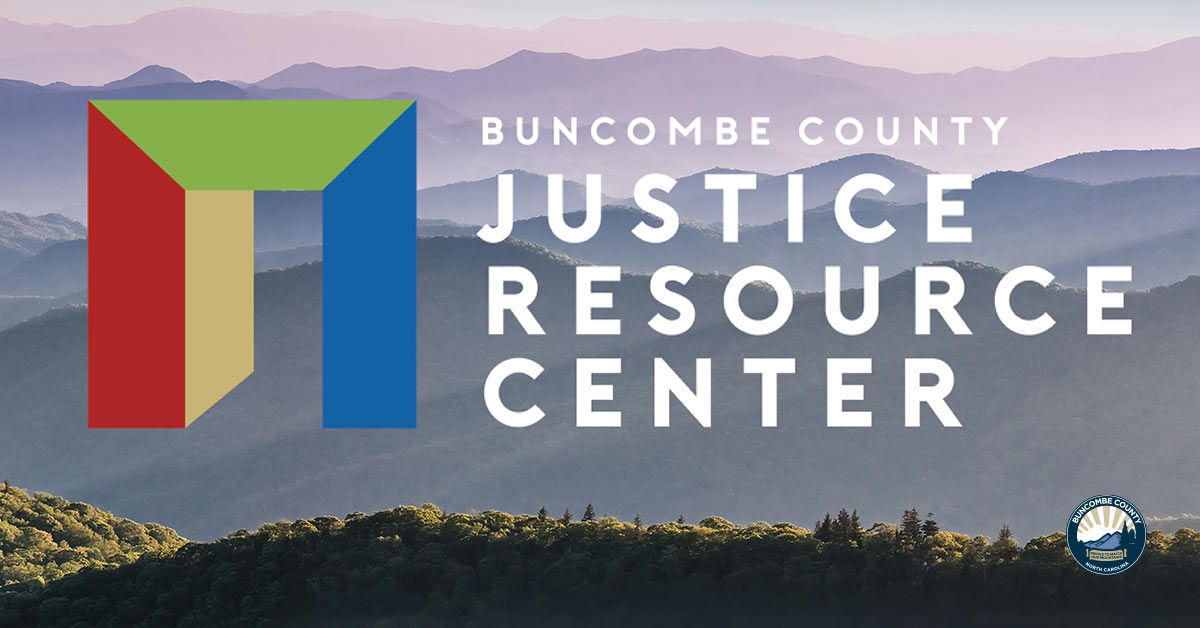 a shot of WNC mountains with the Justice Resource Center logo