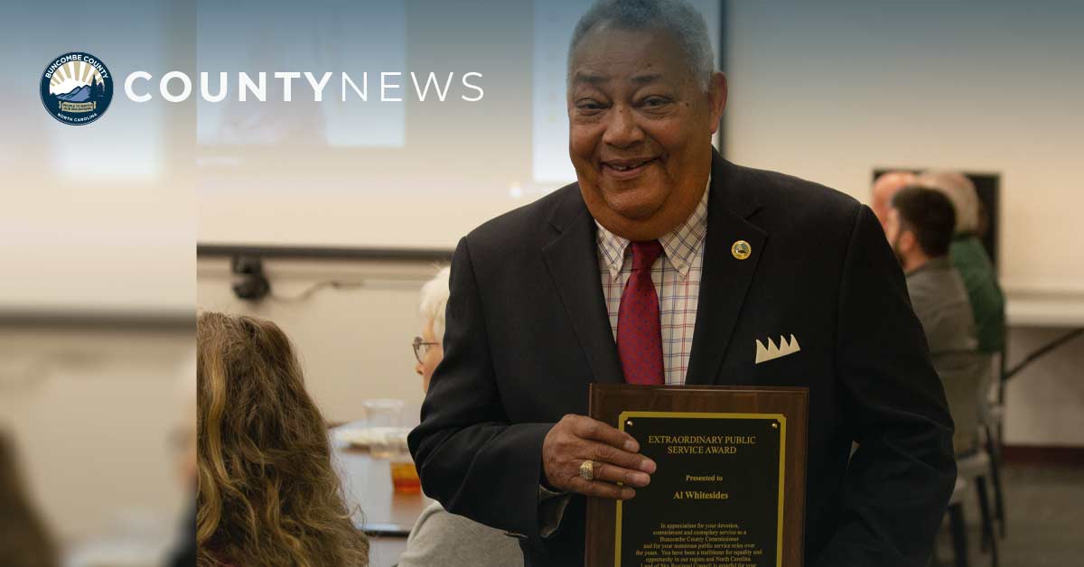 Commissioner Whitesides with an award