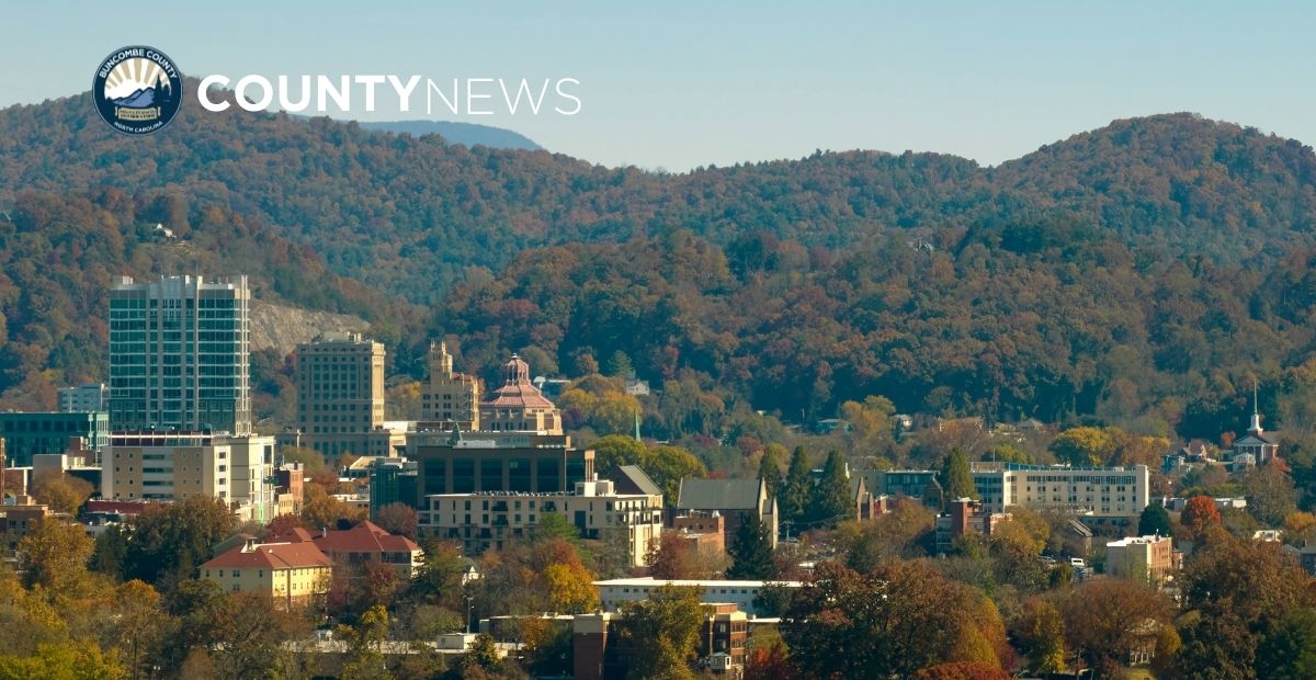 aerial view of downtown asheville with mountains