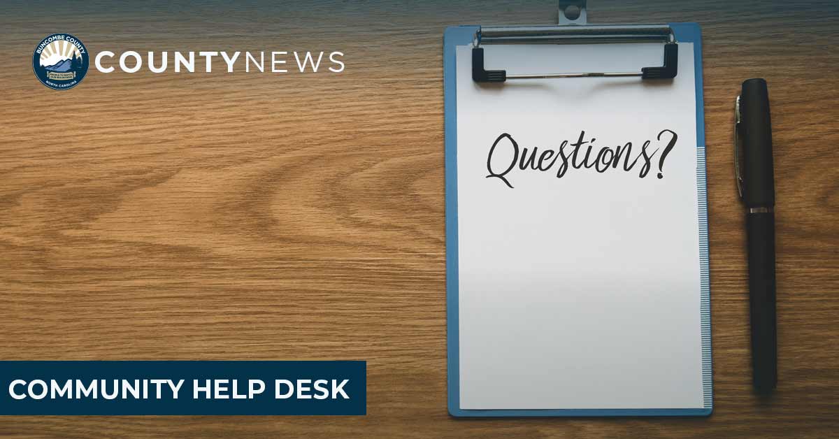  a desk with clipboard that says Questions?