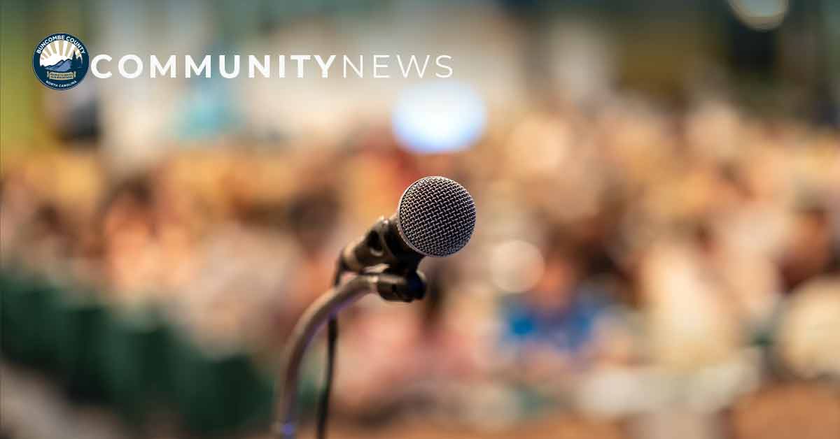 a microphone over a blurred conference room 