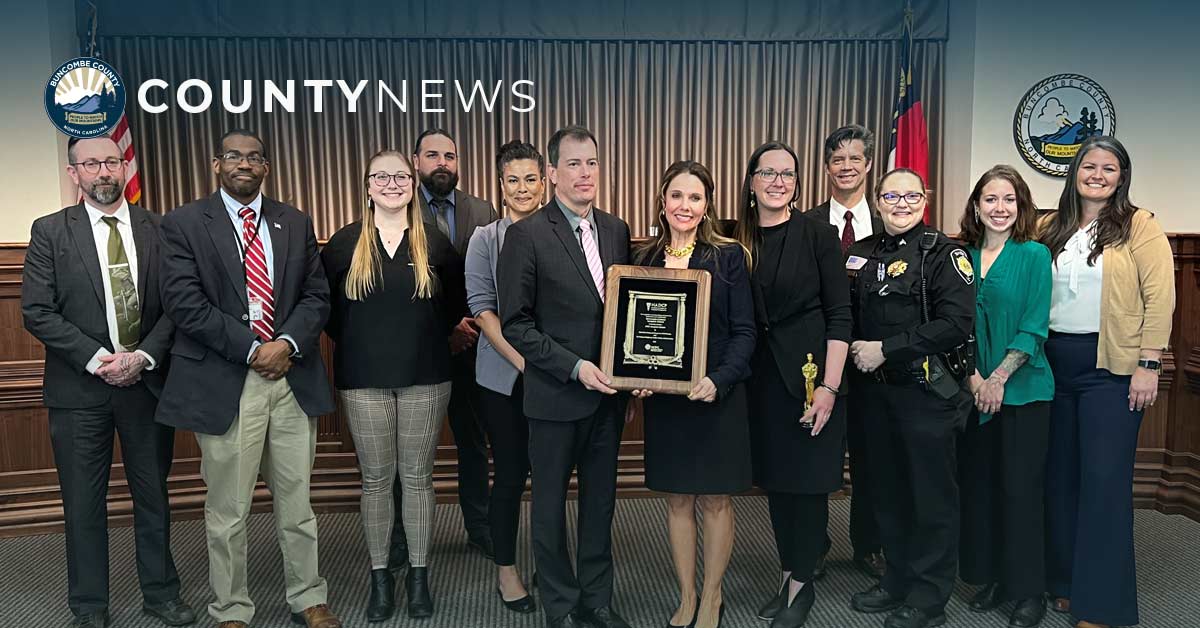 the sobriety court team accepts a plaque