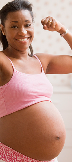 pregnant woman with fist raised